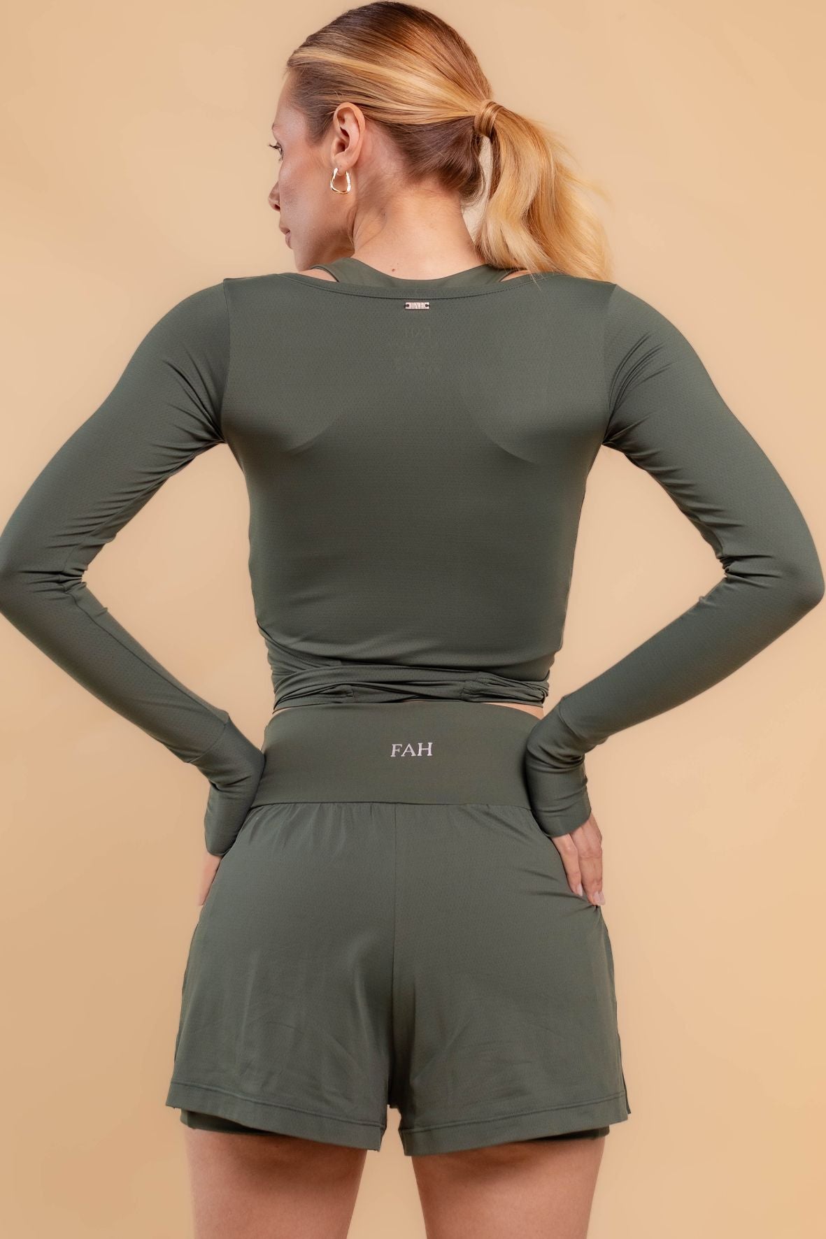 Shorts  corrida dois bolsos verde escuro