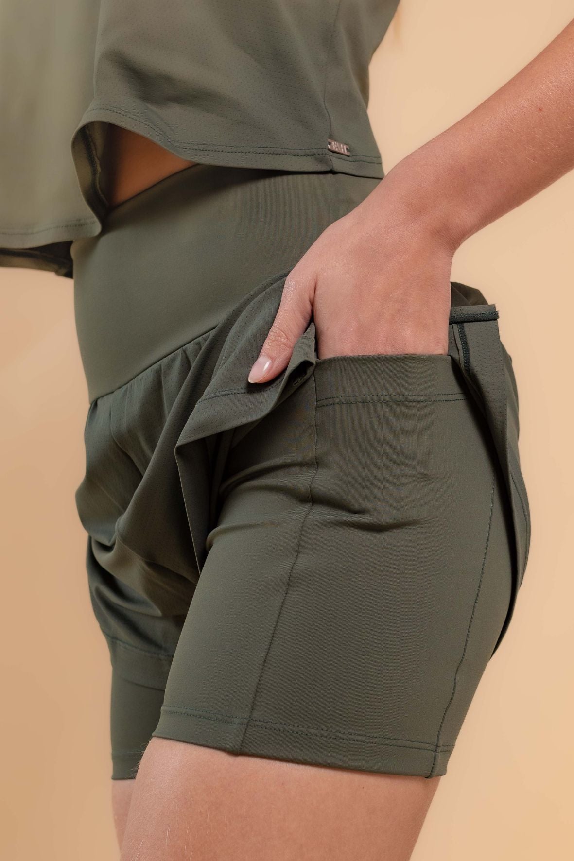 Shorts  corrida dois bolsos verde escuro